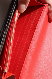 Portafoglio lungo LOUIS VUITTON SARAH con flip