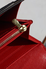 Portafoglio lungo LOUIS VUITTON SARAH con flip