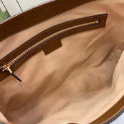 Borsa a tracolla media Gucci serie Padlock GG