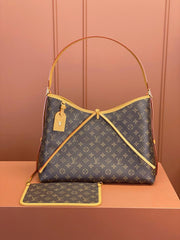 Louis Vuitton Alma Carryall MM in Tela Monogram