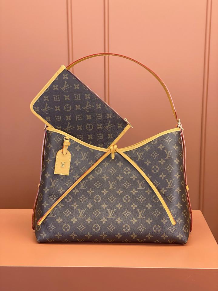 Louis Vuitton Alma Carryall MM in Tela Monogram
