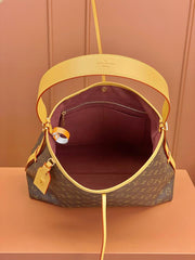 Louis Vuitton Alma Carryall MM in Tela Monogram