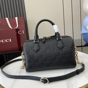 Borsa piccola serie Gucci GG Emblem