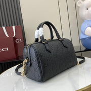 Borsa piccola serie Gucci GG Emblem