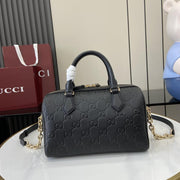 Borsa piccola serie Gucci GG Emblem