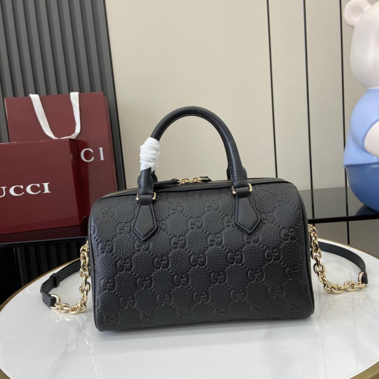 Borsa piccola serie Gucci GG Emblem