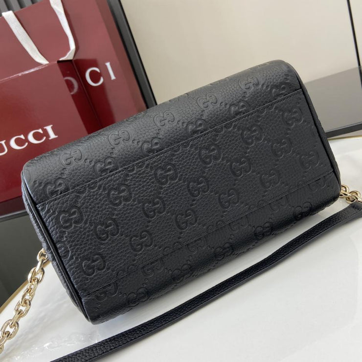 Borsa piccola serie Gucci GG Emblem