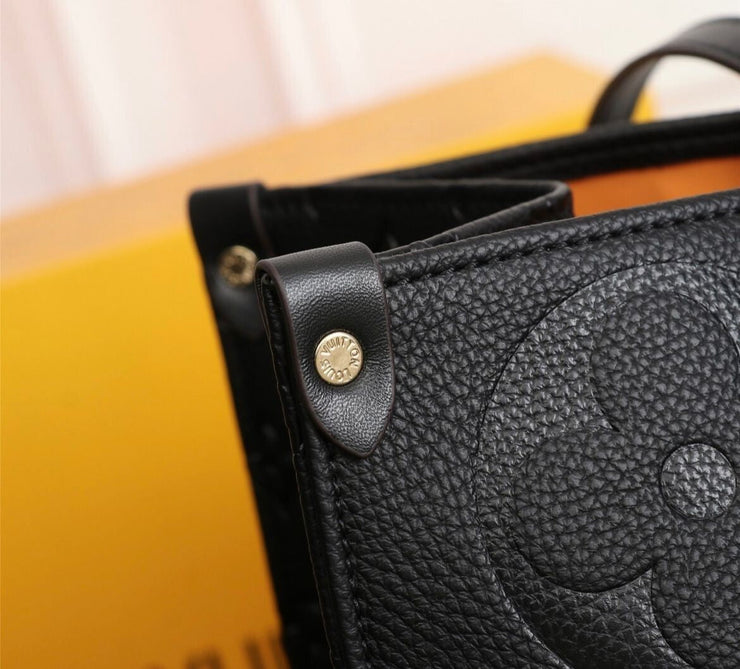 Louis Vuitton OnTheGo MM in Pelle Monogram Empreinte - Nero