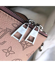 Louis Vuitton Borsa Haumea in Pelle Traforata Mahina - Rosa Magnolia