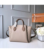 Louis Vuitton Borsa Haumea in Pelle Traforata Mahina - Beige