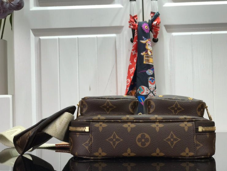 Louis Vuitton Utility in Tela Monogram