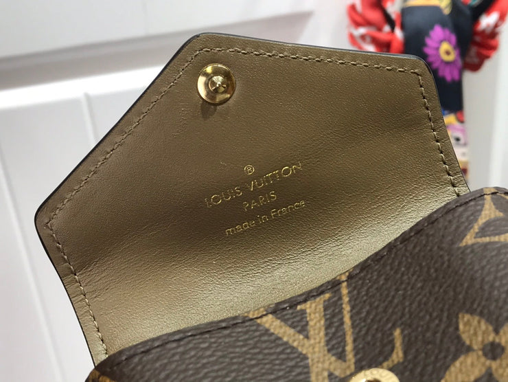 Louis Vuitton Utility in Tela Monogram